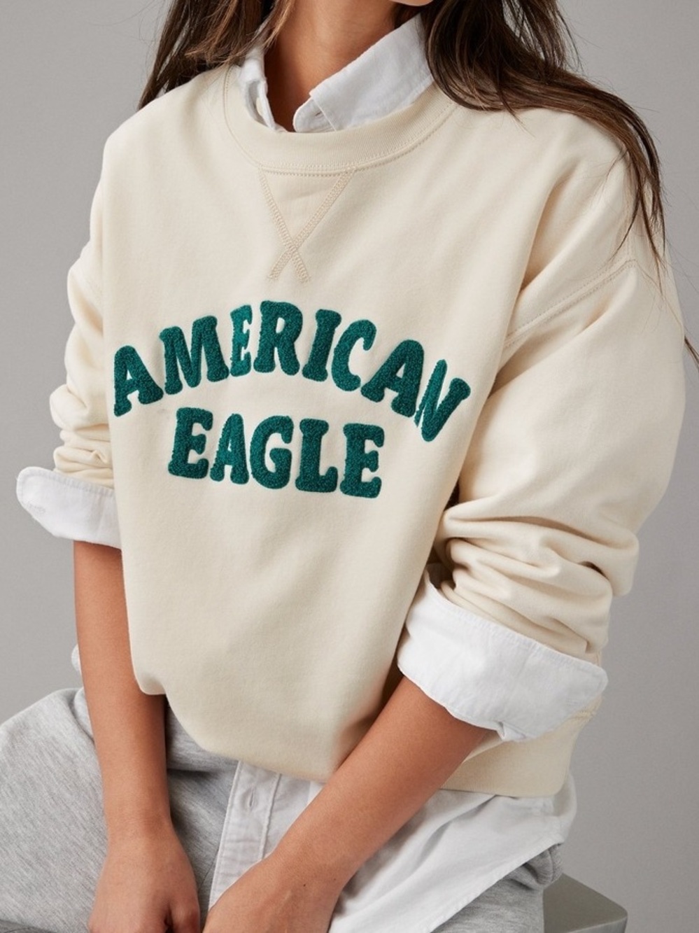 American Eagle Outfitters beige Funday graphic sweatshirt with green text